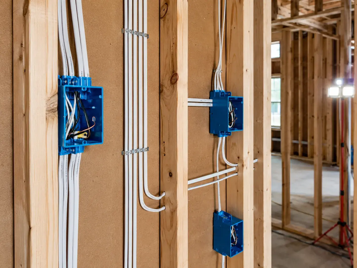 Clean new wiring run through open framing
